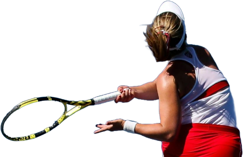 A tennis player wearing red and white is seen mid shot